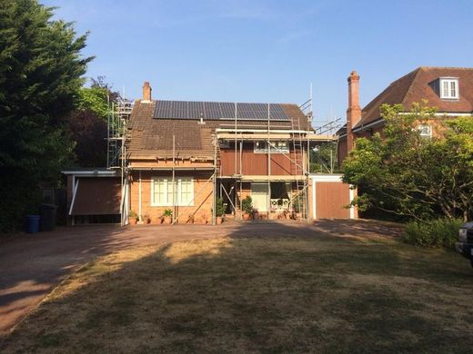 House re-clad, roof and windows — during